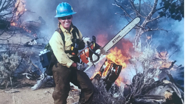 Abby Bolt with chainsaw